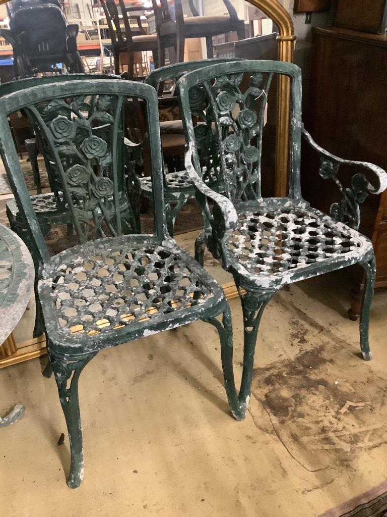 Four cast aluminium chairs, two with arms